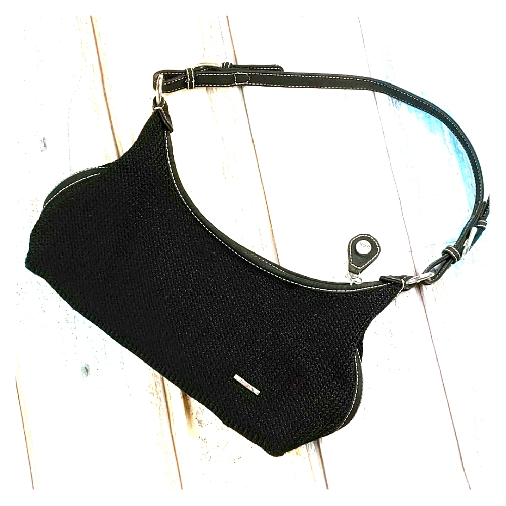 The sak small handbag. Woven with fabric accents.